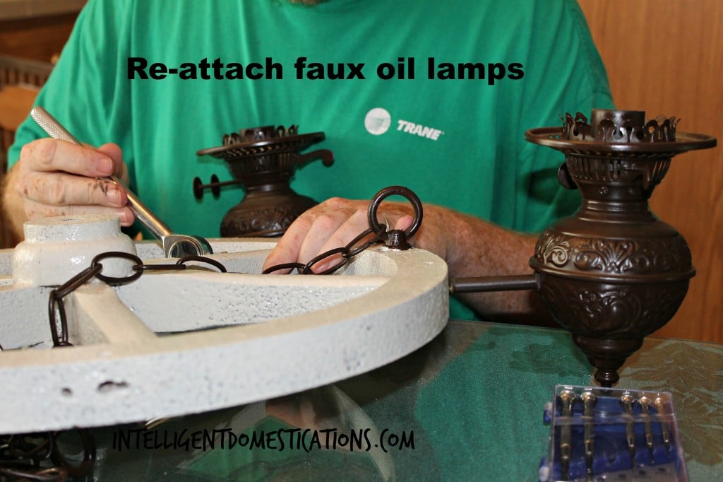 Reattaching the faux oil lamps after all paint has dried.intelligentdomestications.com