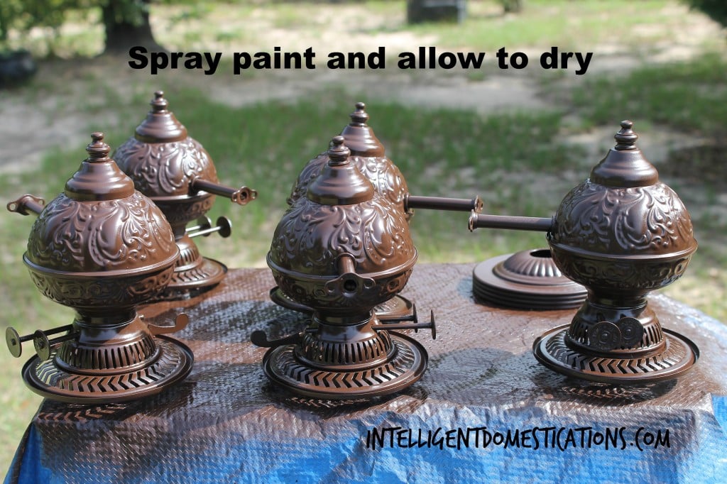 Spray paint the faux oil lamp pieces and allow to dry.intelligentdomestications.com