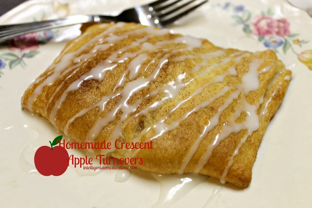 This 4 Ingredient Crescent Apple Turnover recipe will have your house smelling delicious and tickle your taste buds too. It's an easy recipe using Crescent rolls and apples drizzled with homemade icing. #crescentrolls #appledessert #fallfood Crescent Roll Apple Turnover
