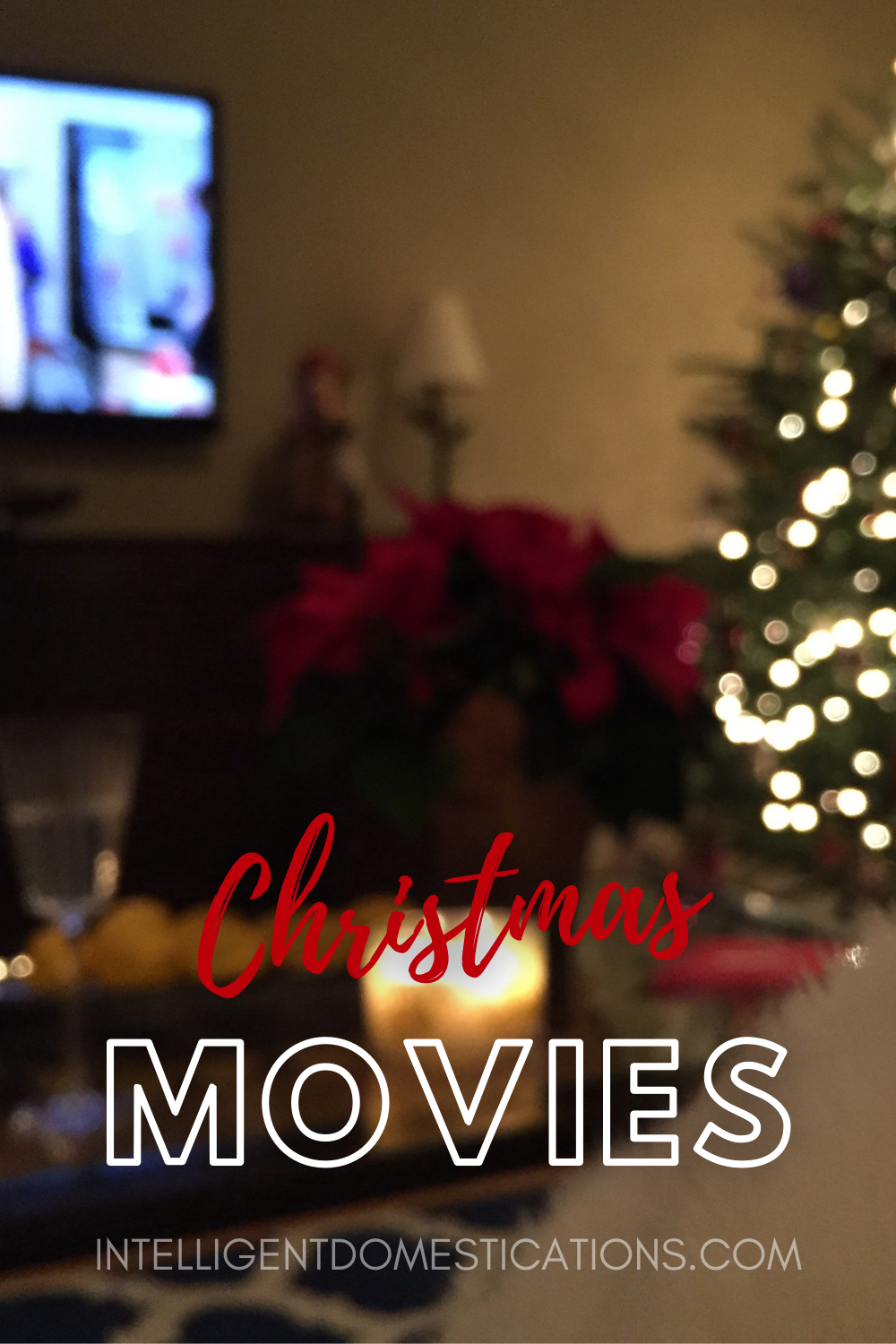 Christmas movies playing on a tv near a Christmas tree in a living room