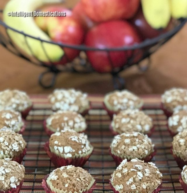These homemade from scratch muffins are a good source of fiber for breakfast. No mixer required because they are so easy to mix by hand. This recipe uses fresh ripe bananas and one naturally sweet apple and Only 1/2 cup of sugar. They store well and make a good start to your day with a fiber filled breakfast. #applemuffins #easy #muffins #applerecipe apple banana muffins