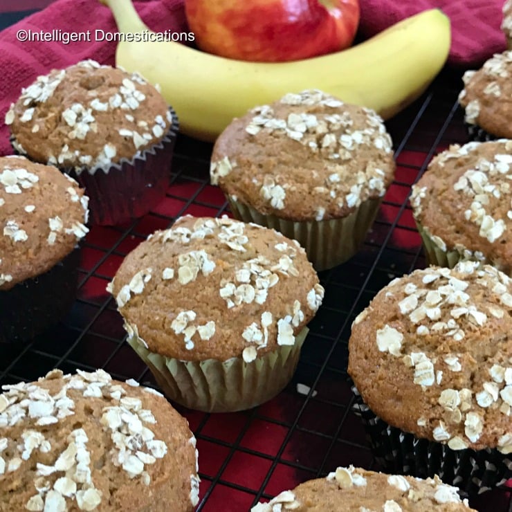 These homemade from scratch muffins are a good source of fiber for breakfast. No mixer required because they are so easy to mix by hand. This recipe uses fresh ripe bananas and one naturally sweet apple and Only 1/2 cup of sugar. They store well and make a good start to your day with a fiber filled breakfast. #applemuffins #easy #muffins #applerecipe