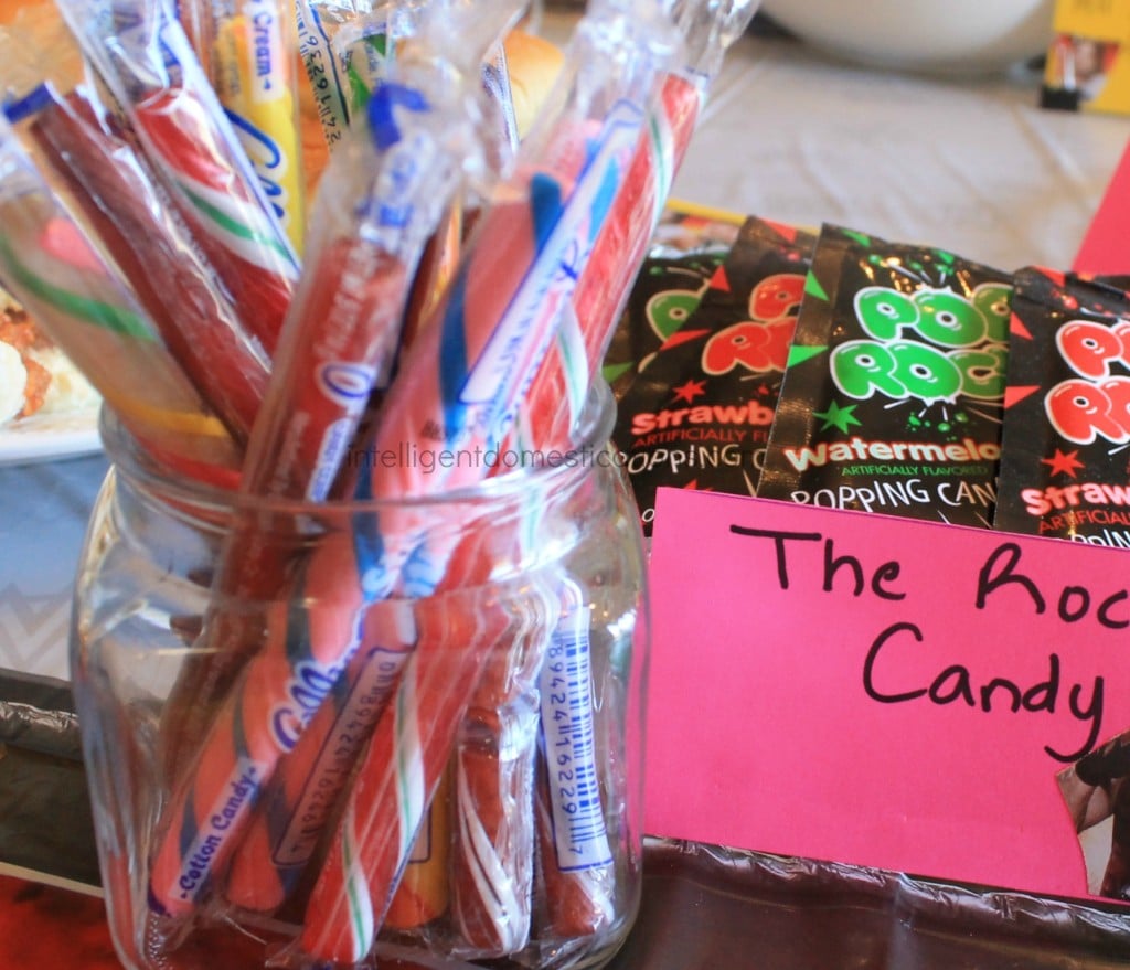 Planning a Wrestlemania party is always the most fun. With WWE Pun Named party food and drinks, we know the menu will be yummy. This is one of our Wrestlemania parties with all the food and decor ideas. #WWEparty WWE Theme Party Ideas with recipes and decor. WWE Party. Serve your guests a Rock Candy bar at your WWE Theme party. Ideas at ingelligentdomestications.com