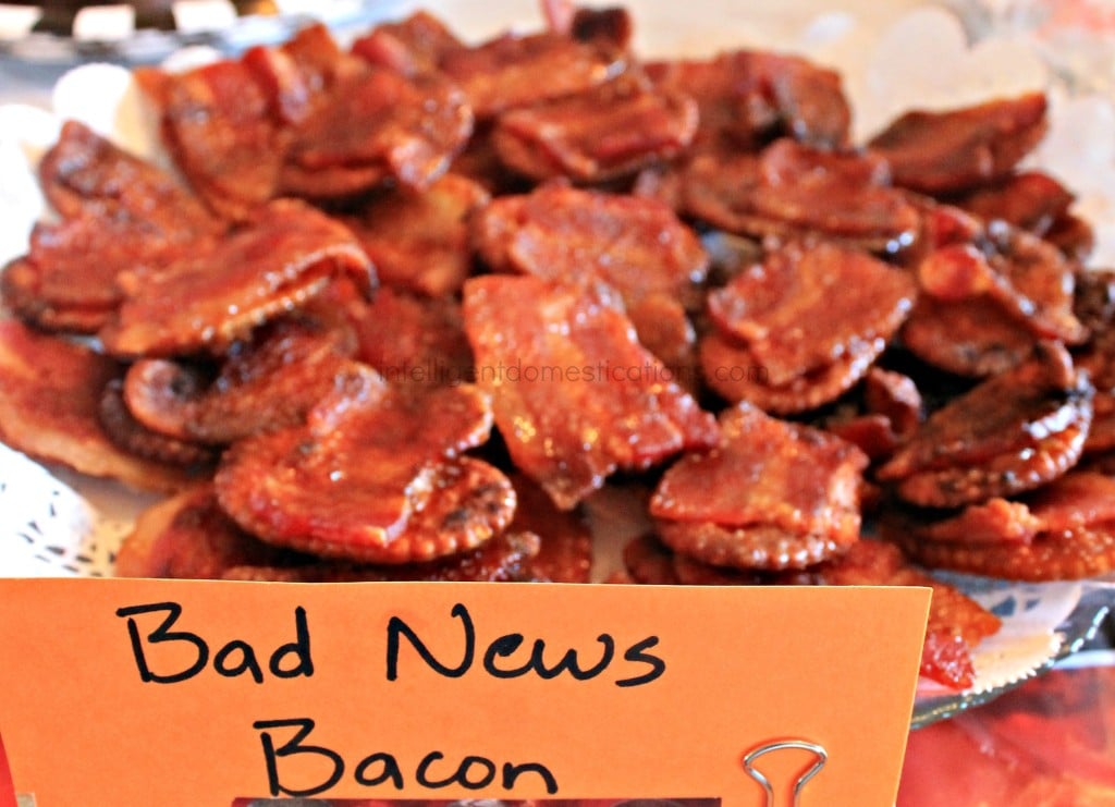Planning a Wrestlemania party is always the most fun. With WWE Pun Named party food and drinks, we know the menu will be yummy. This is one of our Wrestlemania parties with all the food and decor ideas. #WWEparty WWE Theme Party Ideas with recipes and decor. WWE Party. Serve your guests some Bad News Bacon at your WWE Theme Party.intelligentdomestications.com
