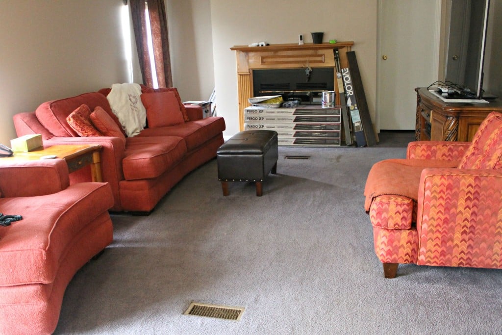 Den freshly painted and waiting on new floors
