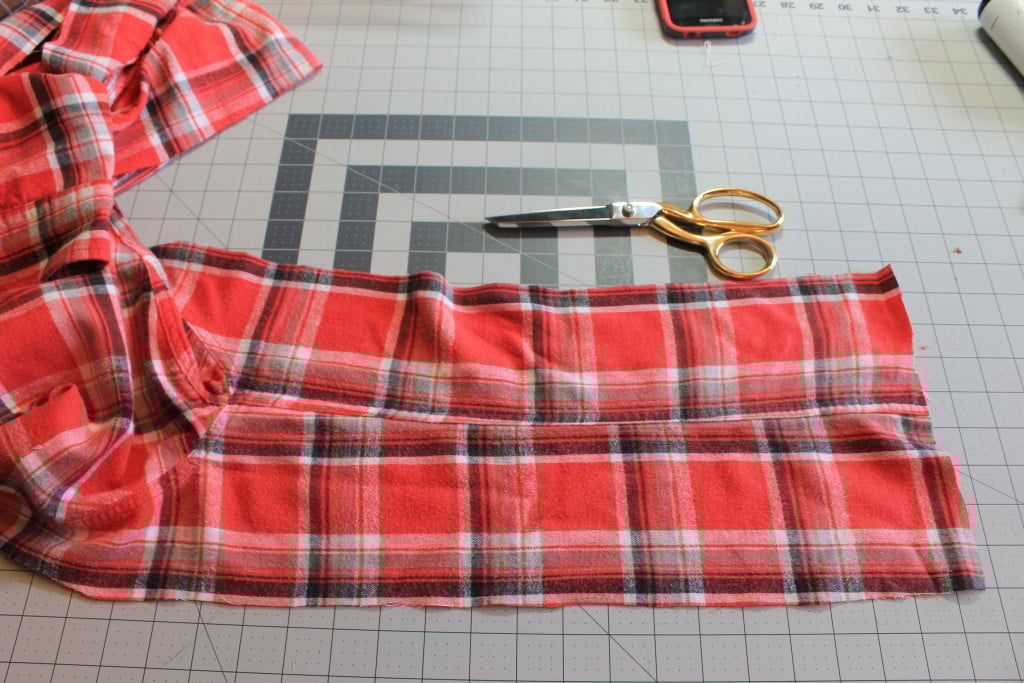 a plaid shirt cut apart