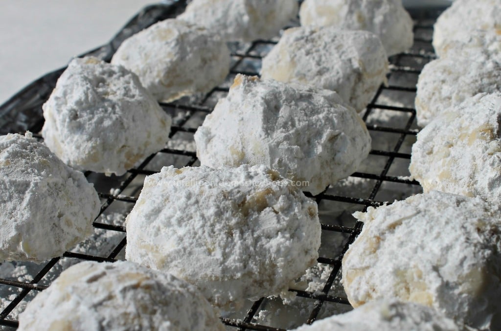 Pecan Snowdrop Christmas Cookies recipe. This old fashioned cookie recipe is very similar to Pecan Sandies. They come out light and just melt in your mouth. Great for Christmas Cookie Exchange parties to take to work or any Christmas cookie occasion. #cookies #intellid