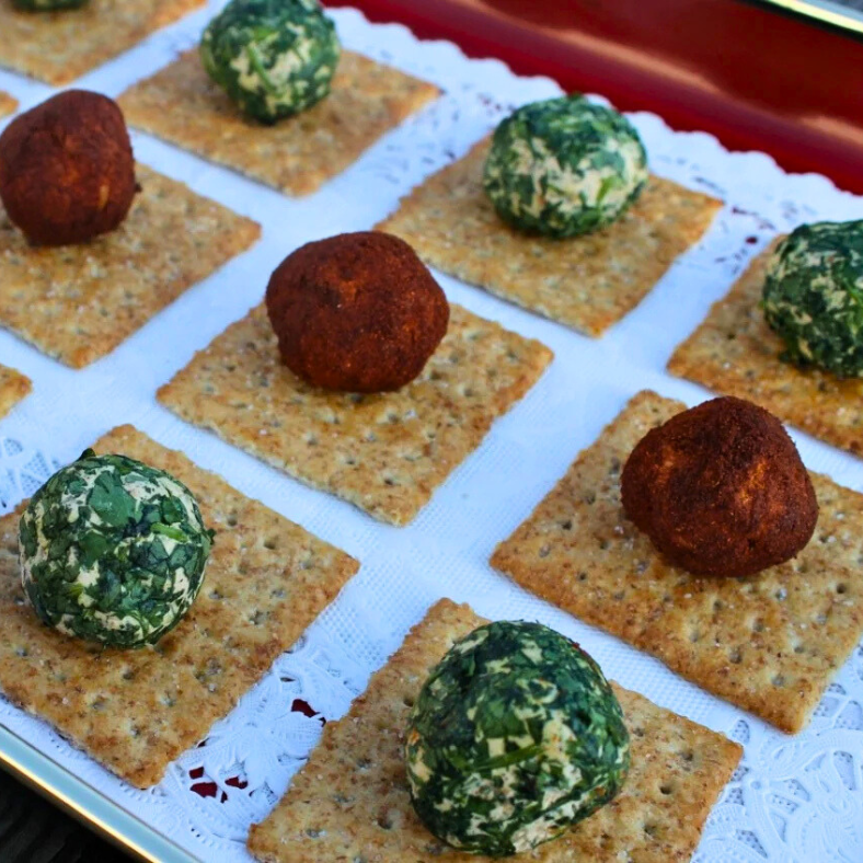 mini cheese balls on crackers