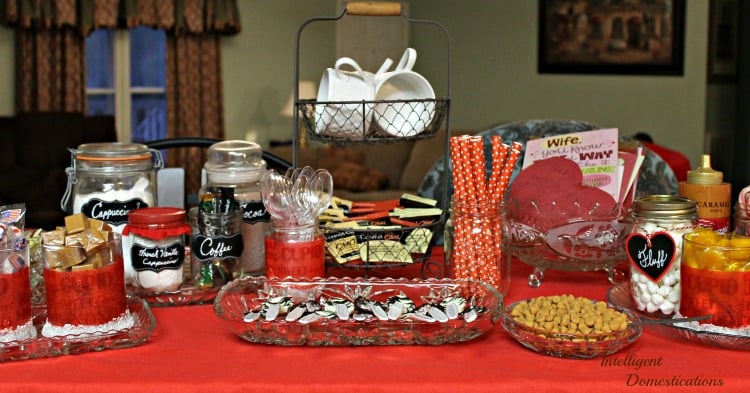 Ideas for setting up your own Valentine's Hot Cocoa Bar. Enjoy the winter season with a warm and welcoming Hot Coffee Bar which can double as a Valentine's Hot Cocoa Bar in February. See out toppings and what we serve on our coffee corner. #coffeebar #hotcocoabar #Valentines a hot cocoa bar with a Valentine's theme