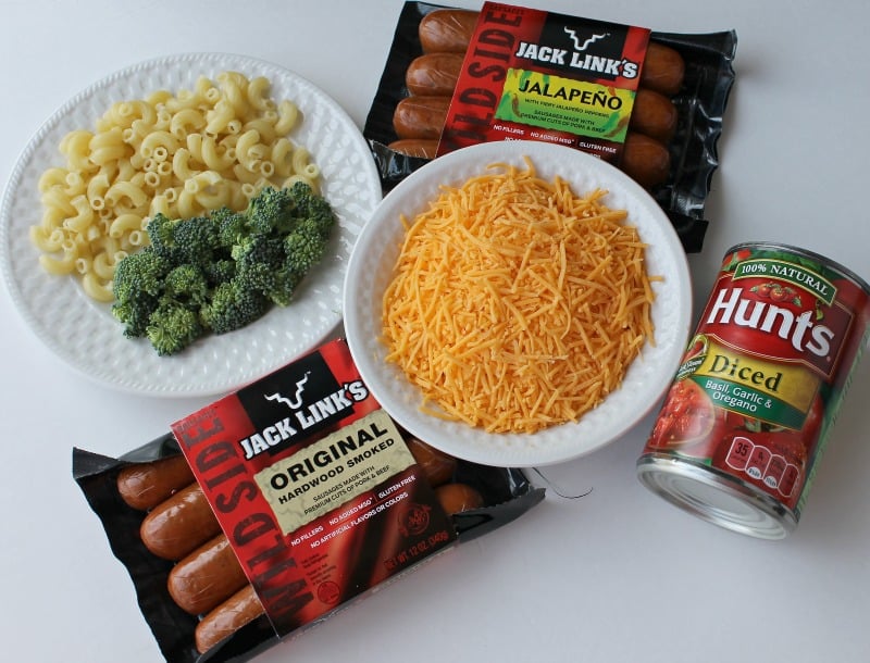 Make this one pot meal for a weeknight dinner or use it as a potluck recipe. This Crockpot Casserole uses only seven ingredients and there is macaroni and cheese involved. Broccoli, Sausage, Macaroni and Cheese combine for a flavor packed meal. #Crockpotrecipe #casserole #potluck Make this one pot meal for a weeknight dinner or use it as a potluck recipe. This Crockpot Casserole uses only seven ingredients and there is macaroni and cheese involved. Broccoli, Sausage, Macaroni and Cheese combine for a flavor packed meal. #Crockpotrecipe #casserole #potluck