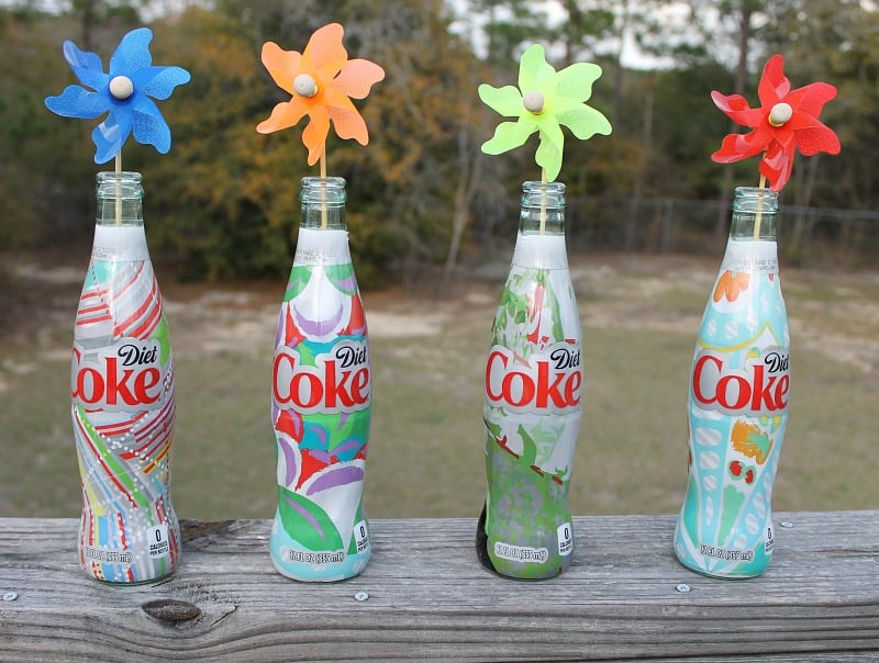 Garden Party Decorations Easy Upcycle project with Diet Coke It's Mine bottes, sand and pinwheeles.intelligentdomestications.com