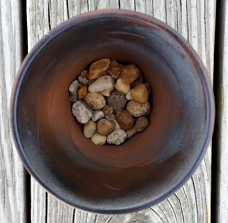 Add rocks in the bottom of the pot before using for plants