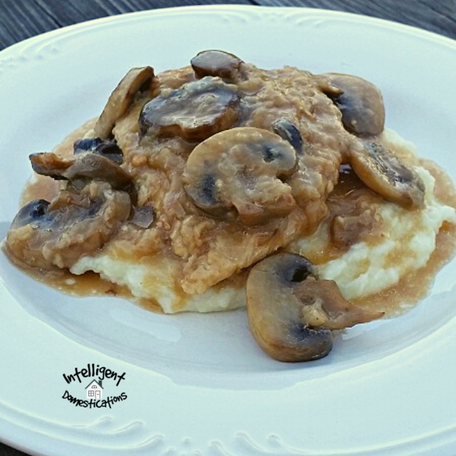 Chicken Marsala on a bed of mashed potatoes