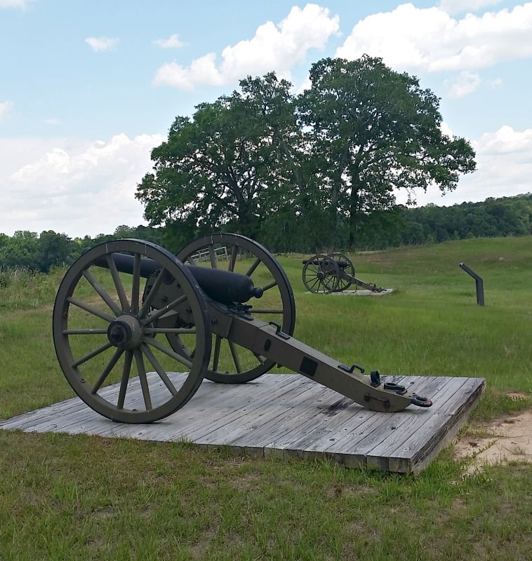 A pair of cannons pointed into the prison site to ward off an uprising at Andersonville Prison