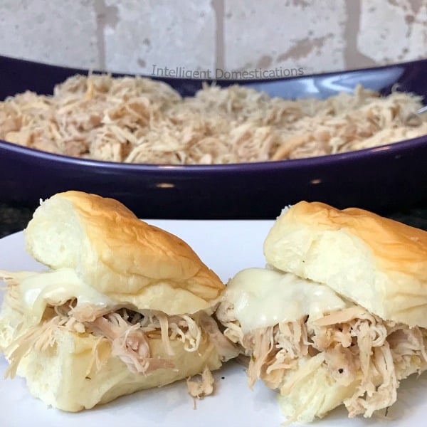 Crockpot Ranch Chicken Sliders easy recipe. Only 3 simple ingredients to make these shredded chicken sliders. Serve them on Hawaiian Rolls or your favorite slider buns. Great for weeknight meals or party food. #shreddedchicken #slidersrecipe