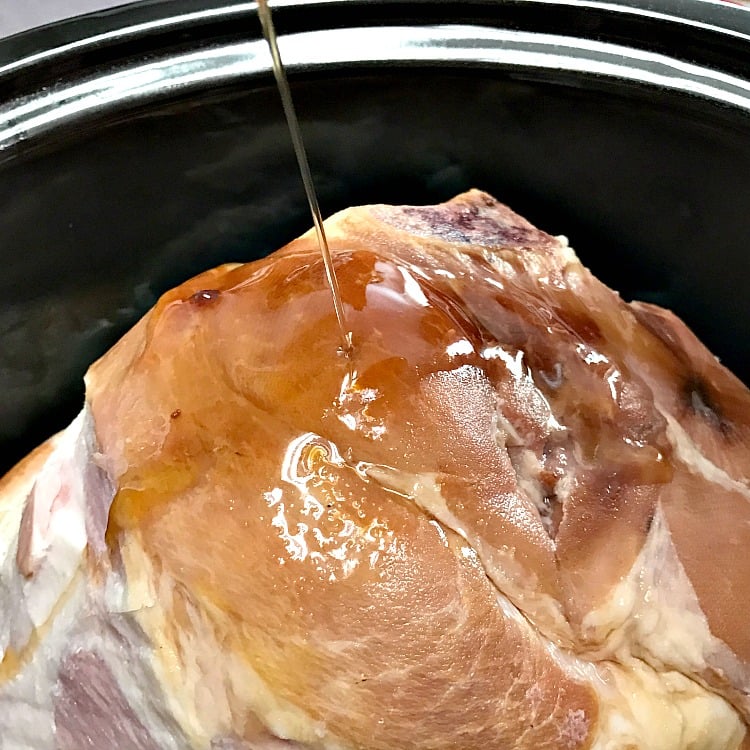 Crockpot Brown Sugar & Pineapple Ham recipe easy recipe. How to cook a delicious homemade Ham in the Slowcooker. You can use this easy four ingredient recipe to cook the ham for Easter, Thanksgiving or Christmas.. #crockpotrecipe #Easter #Christmas #Thanksgiving Crockpot Brown Sugar and Pineapple ham recipe. Turn a classic ham into a delicious and beautiful holiday dish