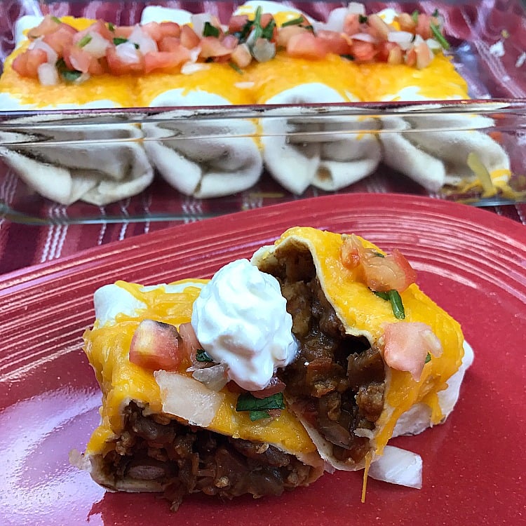 Easy Beef & Bean Burritos made from scratch recipe. Sometimes we want Burritos on Taco Tuesday! Beef and Bean Burritos make a cheap and easy weeknight meal. #burritos #mexicanrecipe #tacotuesday Easy Beef & Bean Burritos made from scratch recipe. Sometimes we want Burritos on Taco Tuesday! Beef and Bean Burritos make a cheap and easy weeknight meal. #burritos #mexicanrecipe #tacotuesday
