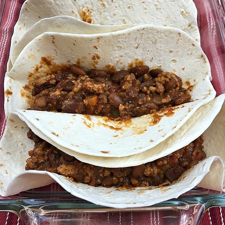Easy Beef & Bean Burritos made from scratch recipe. Sometimes we want Burritos on Taco Tuesday! Beef and Bean Burritos make a cheap and easy weeknight meal. #burritos #mexicanrecipe #tacotuesday Easy Beef & Bean Burritos made from scratch recipe. Sometimes we want Burritos on Taco Tuesday! Beef and Bean Burritos make a cheap and easy weeknight meal. #burritos #mexicanrecipe #tacotuesday