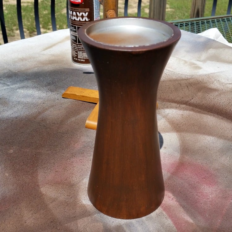 big wooden candle stand used as base for two tier tray