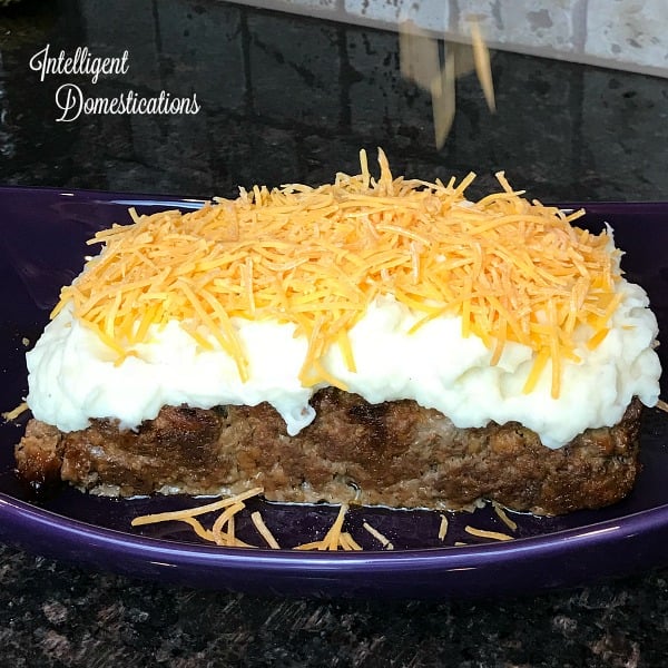 Cheesy Mashed Potato Covered Meatloaf.. How to make cheesy mashed potato topped meatloaf. A Christmas Story Mashed Potato Meatloaf recipe