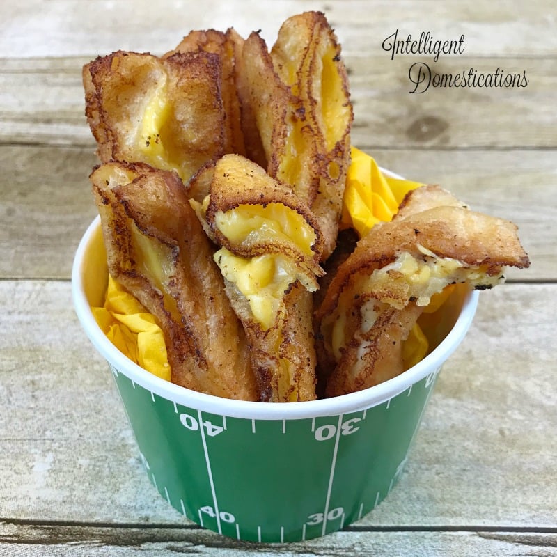 How to make Grilled Cheese fries using Crescent Rolls and process cheese like Velveeta. The deep fried Grilled Cheese fries are a delicious appetizer for Game Day or any party. #partyfood #appetizer #friedcheese