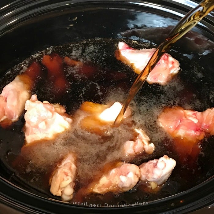How to make Crockpot Lemon Pepper wings using only 3 ingredients. 3 Ingredient Lemon Pepper Wings recipe. Lemon Pepper Chicken Wings. Pouring the cola over the wings in the Crockpot. #Wingsrecipe #partyfood #Crockpotwings #CrockpotLemonPepperWings #3ingredients