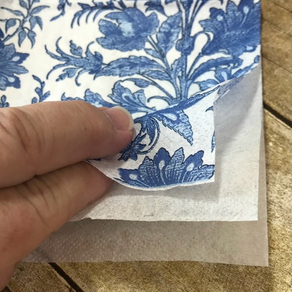 Separate the layers of napkins prior to using them for decoupage. Make your own Blue and White Orbs using napkins, Wiffle balls and decoupage. See how easy it is. DIY Orbs for home decor. How to make your own Orbs for staging bowls and trays. #diy #makeyourown #diyorb #diyblueandwhitedecor #howtostageabowl #homedecor