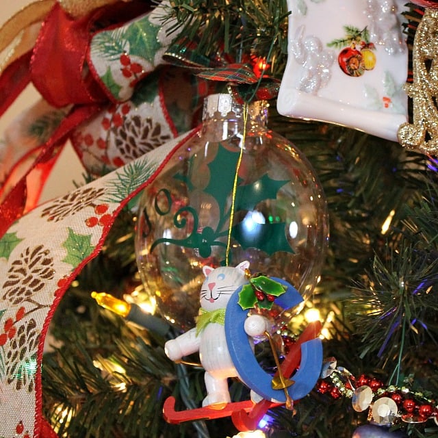 Decorating a large Christmas tree with Ribbons and Bows helps to stretch the ornaments. Get yourself a Bowdabra and make your own bows. #DIYChristmas #Christmas