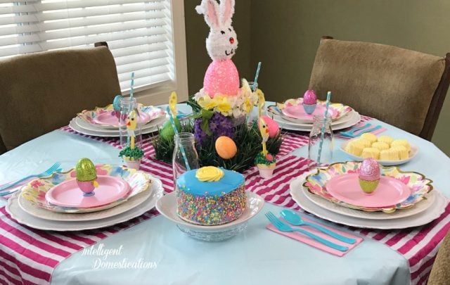 a dining table decorated for kids at Easter