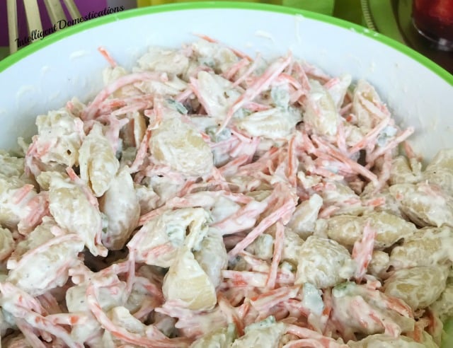 Our Hawaiian Pasta Salad recipe is very easy to make. We left the onions out but use Onion Powder instead. This macaroni salad is a big hit at Pot Luck dinners. We use pasta shells instead of macaroni noodles because they trap that delicious made from scratch creamy dressing. #pastasalad #macaronisalad #hawaiiansalad 