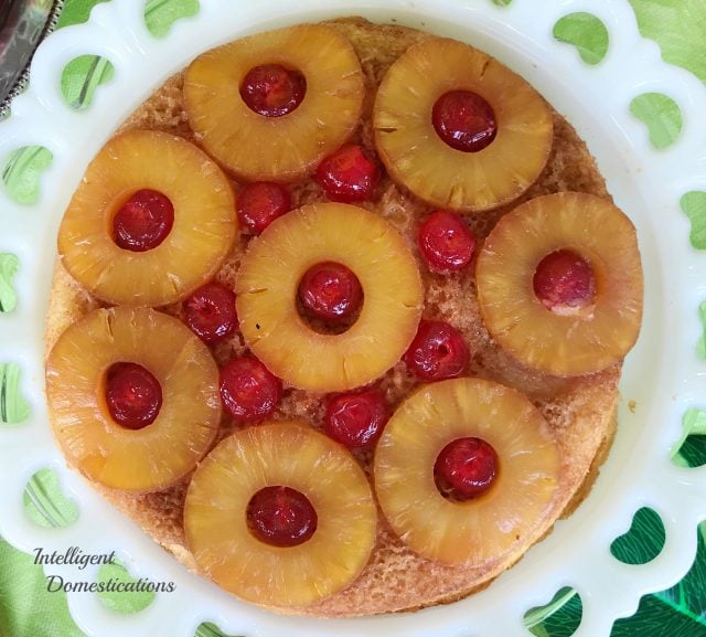 Our easy recipe for Pineapple Upside Down cake is a classic. We make the topping from scratch in the Iron Skillet and then use our favorite boxed mix for the cake. This Pineapple Upside Down Cake will make a one layer version in a large iron skillet. #cake #upsidedowncake #pineappledessert Pineapple Upsidedown Cake easy recipe not quite from scratch. We make the topping from scratch and use a mix for the cake. #cake #upsidedowncake