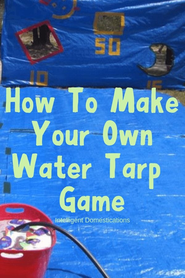 This one DIY Water Tarp Game will keep the kids busy with backyard summer water activities for hours! It's versatile for playing in the water. Play Water Balloon games, Water Bomb Target competitions. Pool Noodle Sword Fighting and a Slip and Slide surface and even use the Target Backdrop as a Photo spot! #watergames #summergames #outdoorplay