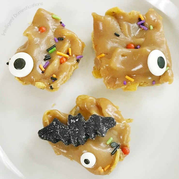 Halloween dessert bars cut into squares and displayed on a white dish