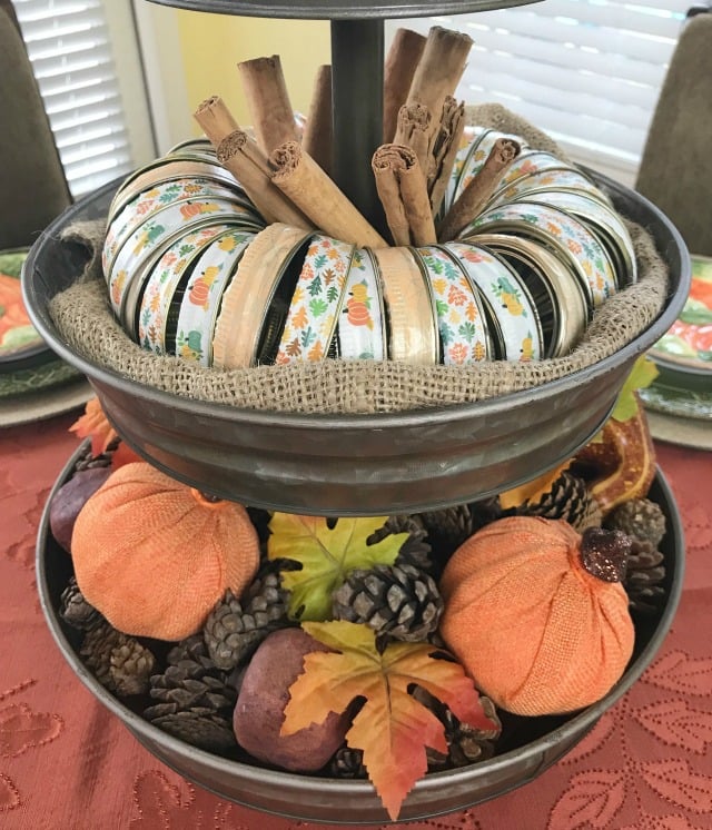Make your own Mason jar ring pumpkins decorated with pretty Fall Washi Tape. I used mine to style a 3 tier metal stand for Fall decor. Make your own Mason jar ring pumpkins decorated with pretty Fall Washi Tape. I used mine to style a 3 tier metal stand for Fall decor.