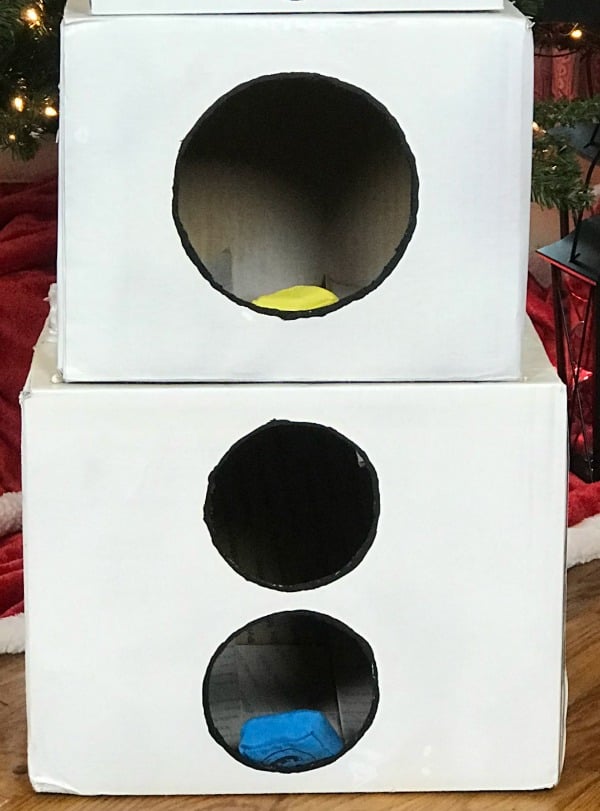 Make this cheap and easy Cardboard Box Snowman Bean Bag Toss Game for the preschoolers and toddlers to play at your Christmas party.