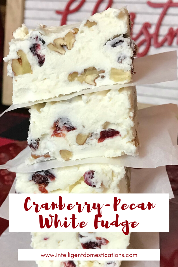 This Easy Recipe for Cranberry Pecan White Fudge is perfect for gifting or party food. Take a batch to the office party or Christmas Pot Luck.