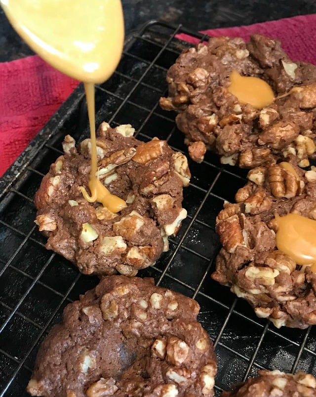 These made from scratch Chocolate Pecan Thumbprint cookies are light and soft with just the right amount of chewy. The cocoa powder makes them chocolate all the way through. These made from scratch Chocolate Pecan Thumbprint cookies are light and soft with just the right amount of chewy. The cocoa powder makes them chocolate all the way through.