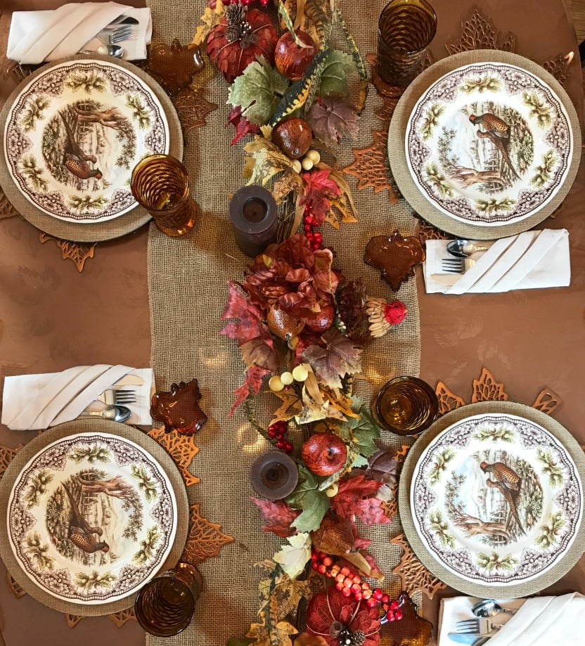 An overhead view of a table decorated for Thanksgiving