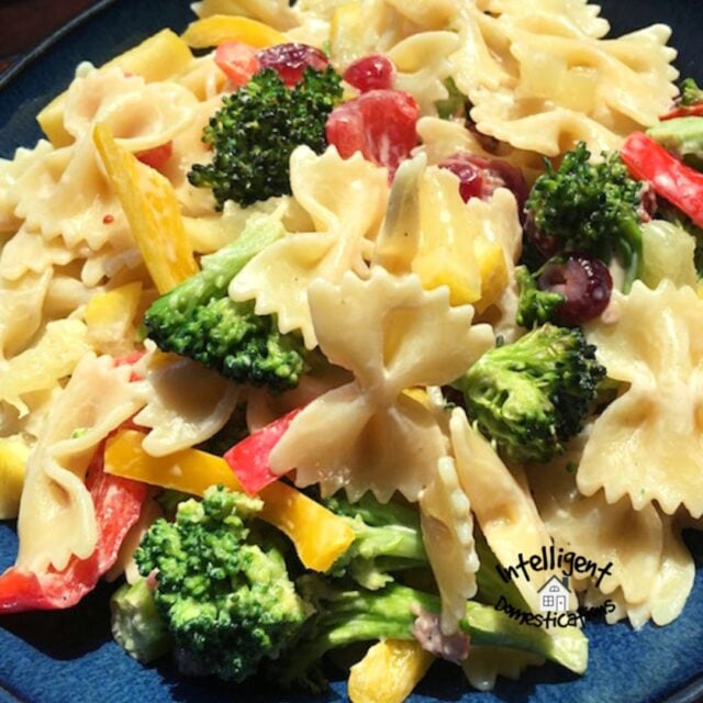 Broccoli Bowtie Pasta dish served in a dark blue dish