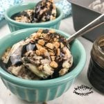 Ice Cream in a bowl with toffee bits and chocolate drizzled on top