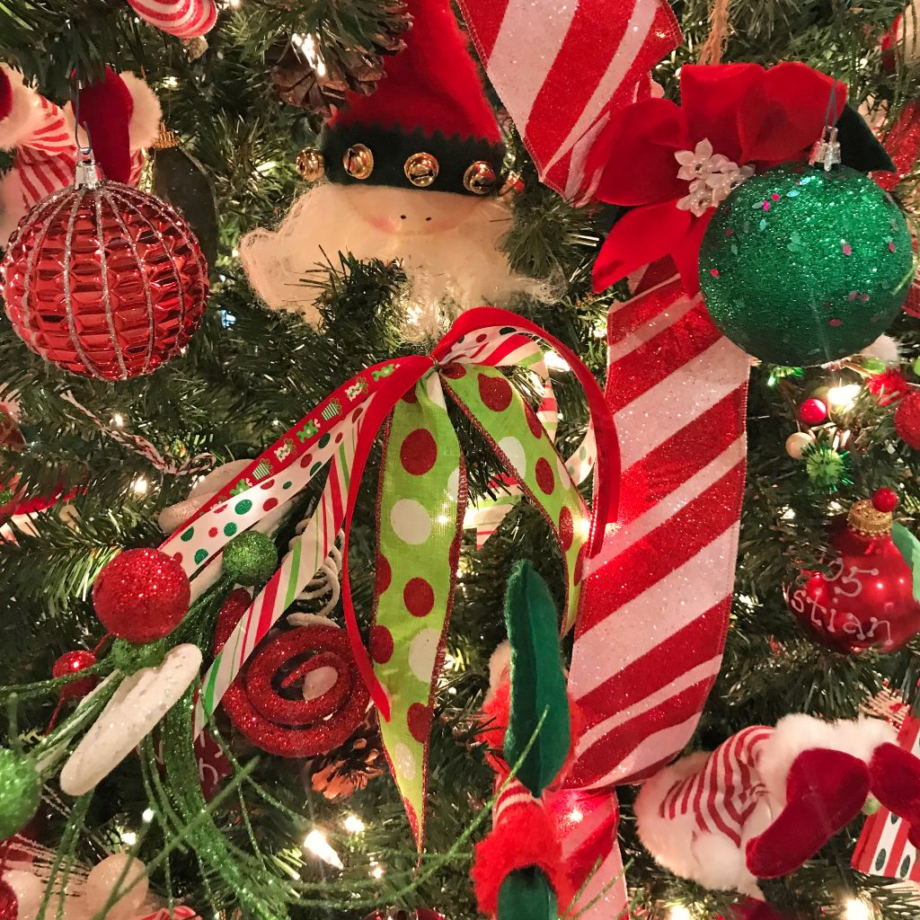 Ribbon bow and ornaments on a Christmas tree