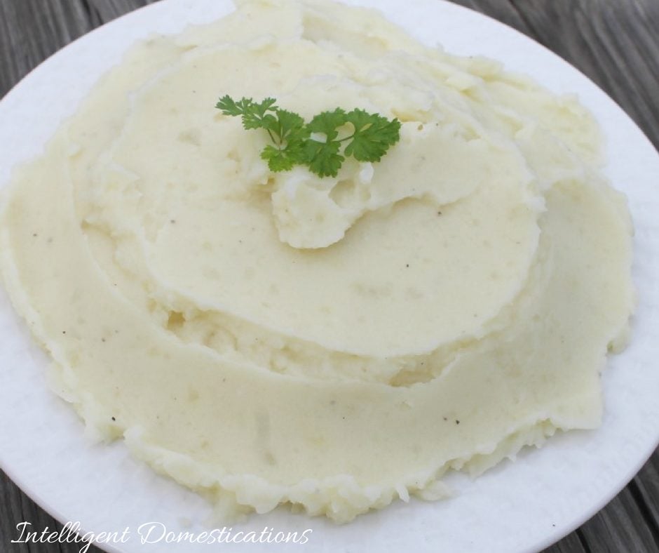homemade mashed potatoes in a white bowl