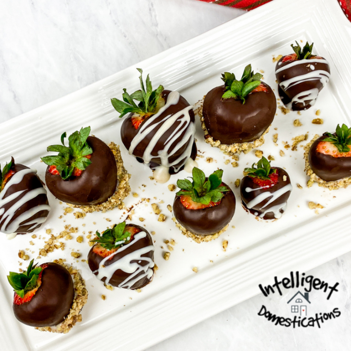 Milk Chocolate dipped strawberries with white chocolate drizzle and crushed pecans