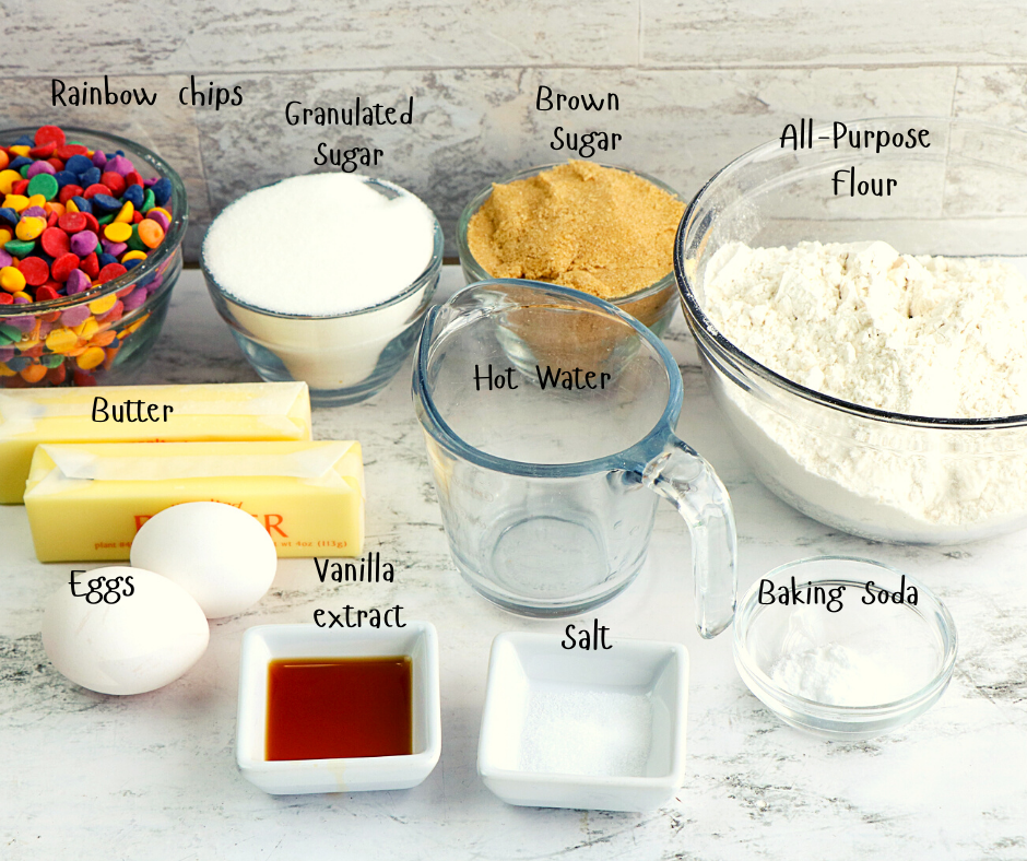 cookie ingredients in bowls on a white surface