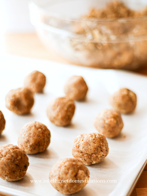 Cake balls on a cookie sheet