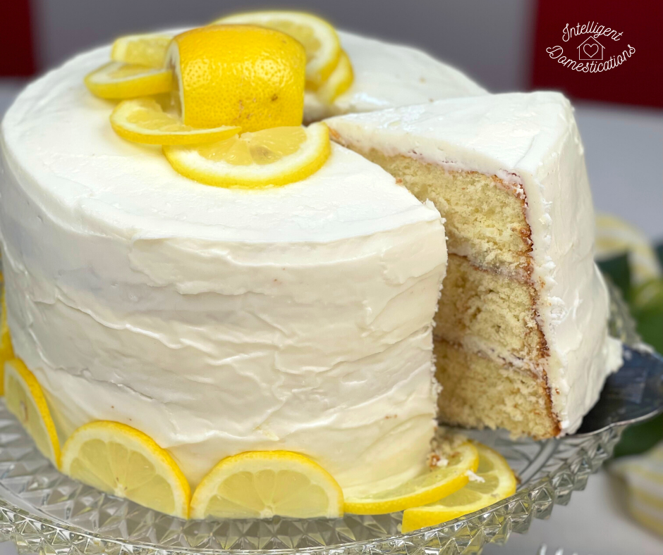 a slice being lifted from a lemon layer cake