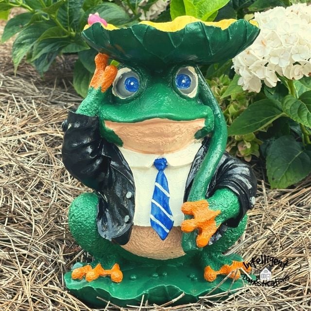 Bright painted Frog Statue in the yard