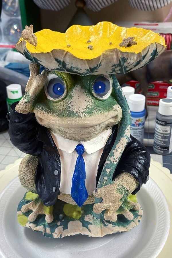 Frog statue in the process of being painted
