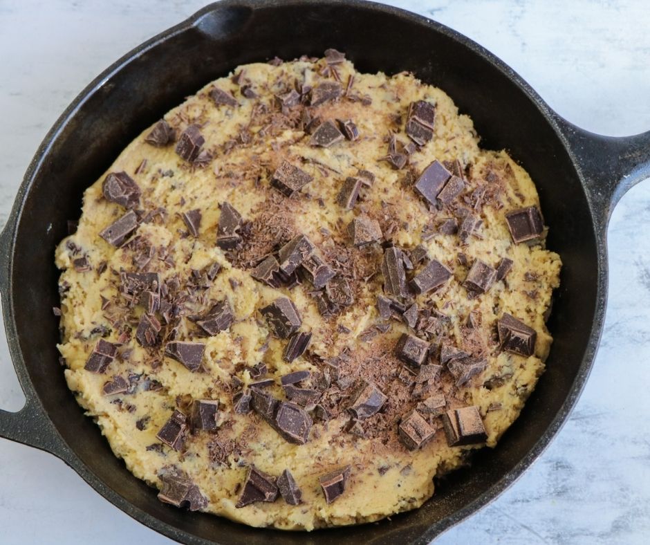 Chocolate chip Cookie dough in iron skillet