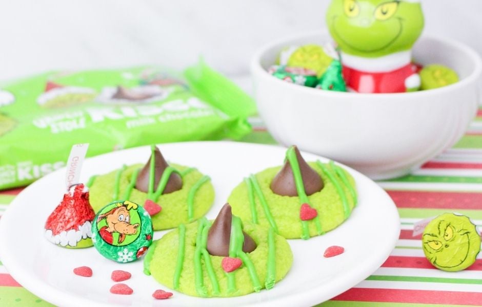 Grinch Blossom Cookies on a white plate